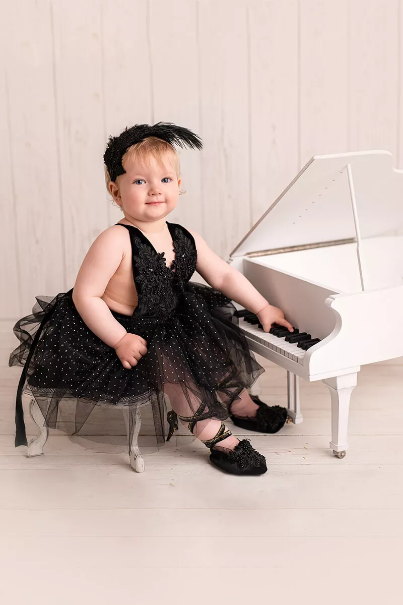 Baby photographed during a professionally styled milestone session